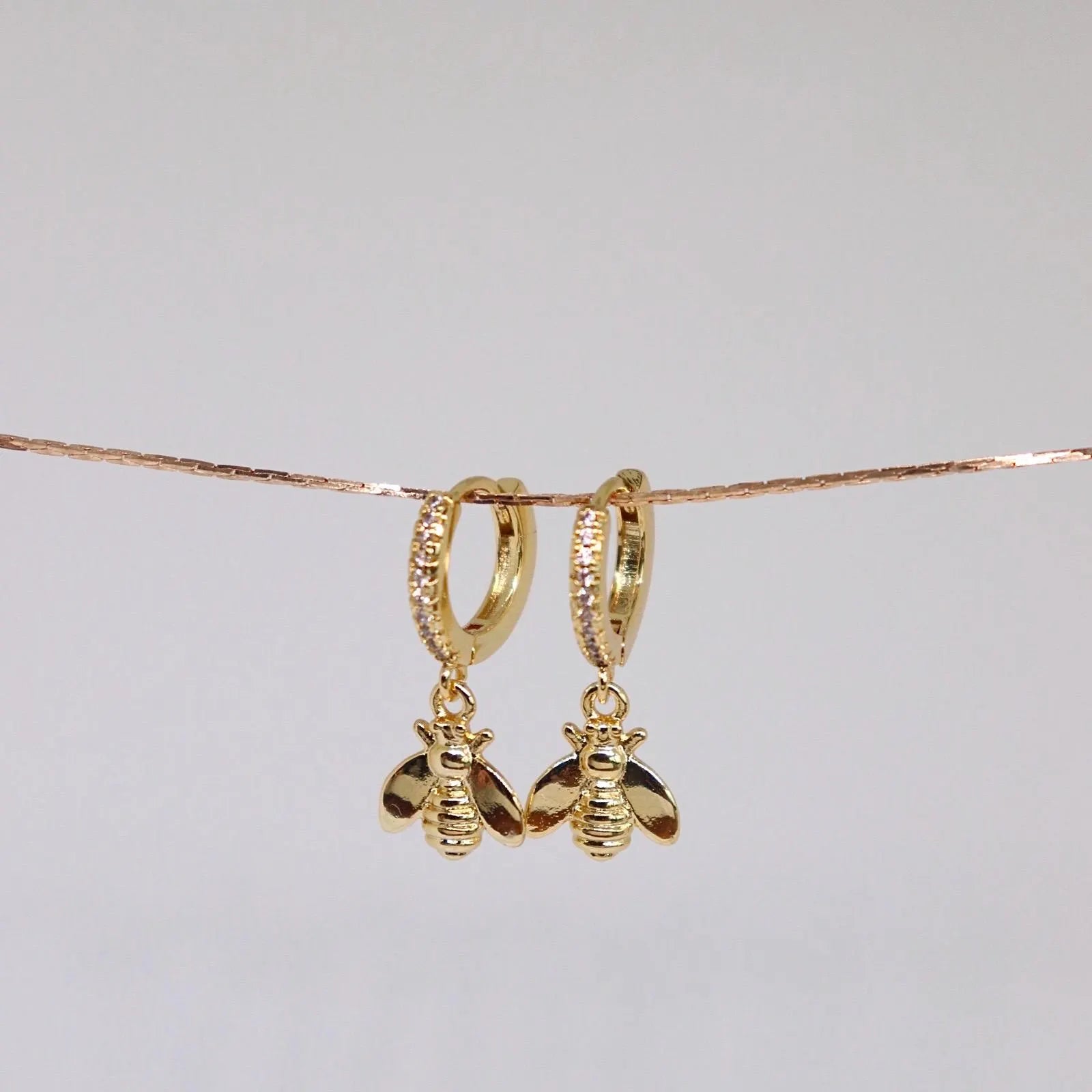 Bee Charm Pave Huggie Earrings